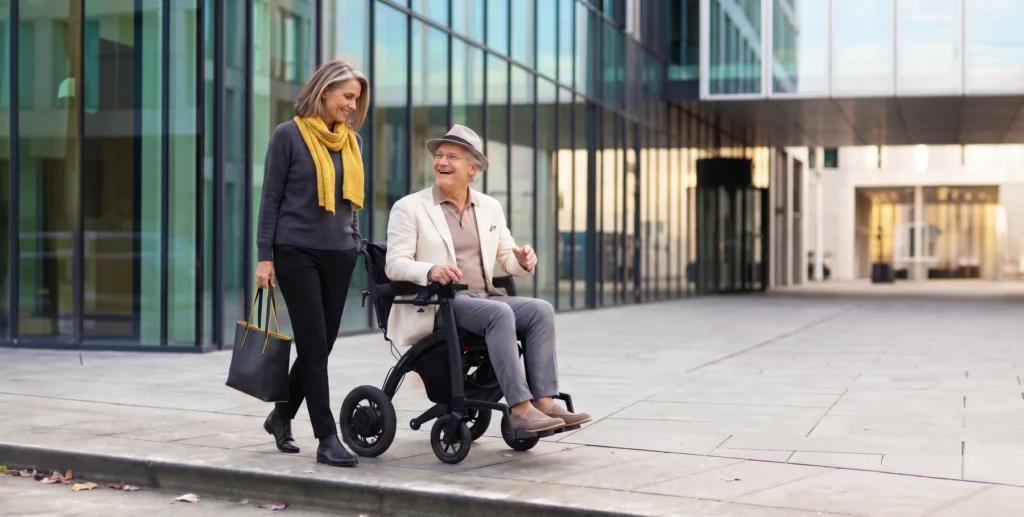 Rollz Motion Electric joystick controlled rollator driving through a city